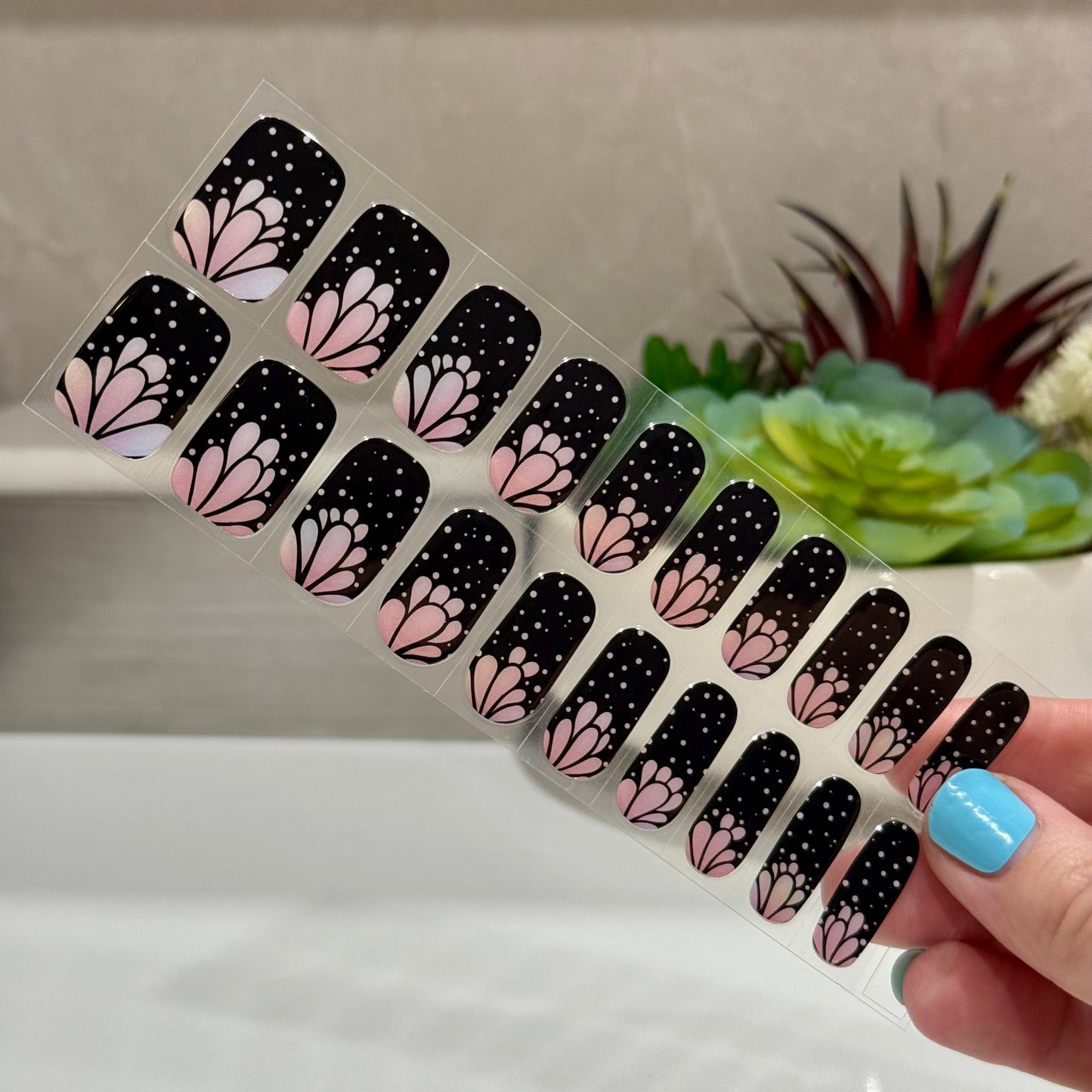 Semicured gel nails in black and pink 'flapper' design
