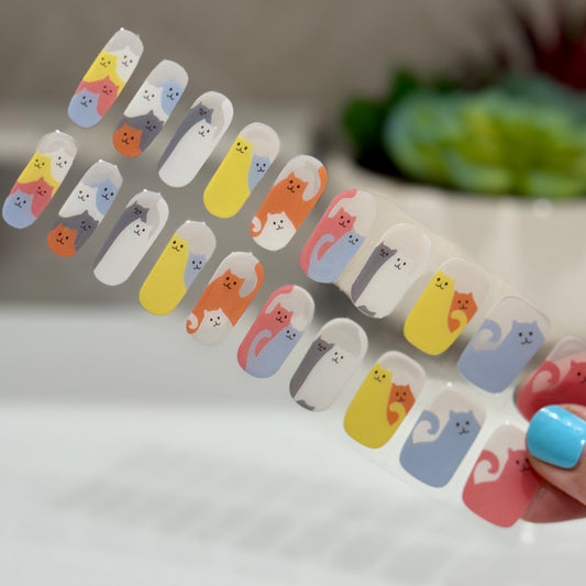 semicured gel nails with multicoloured cat design