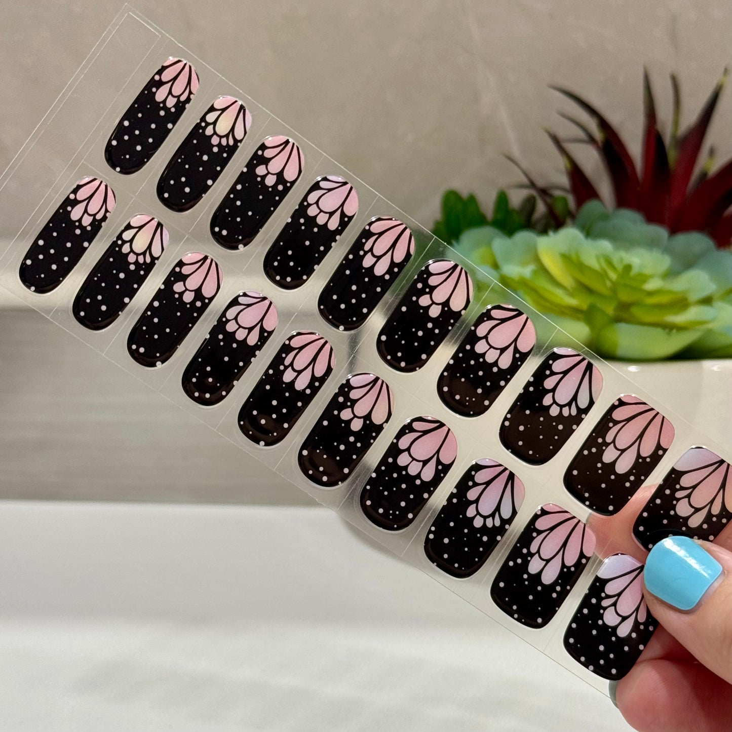Semicured gel nails in black and pink 'flapper' design